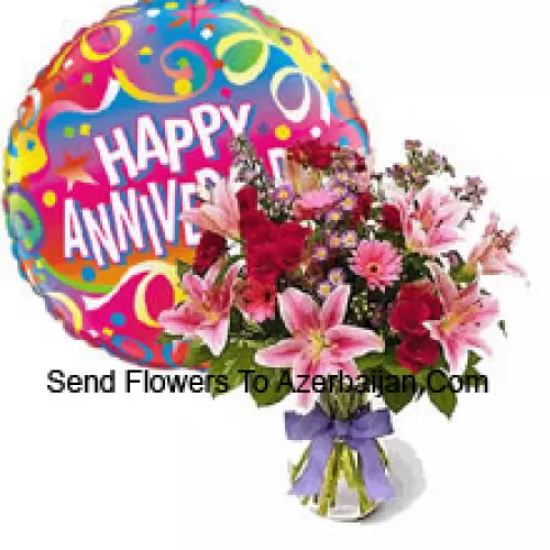 Assorted Flowers In A Vase Along With Anniversary Balloon