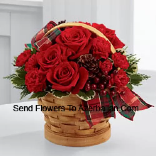 Greet your special recipient with seasonal beauty and blessings. Red roses and mini carnations are gorgeously arranged in a natural woodchip basket with assorted holiday greens, natural pinecones, and berry pics, accented with a tartan plaid ribbon to create a gift that wishes everything this wondrous season has to offer (Please Note That We Reserve The Right To Substitute Any Product With A Suitable Product Of Equal Value In Case Of Non-Availability Of A Certain Product)